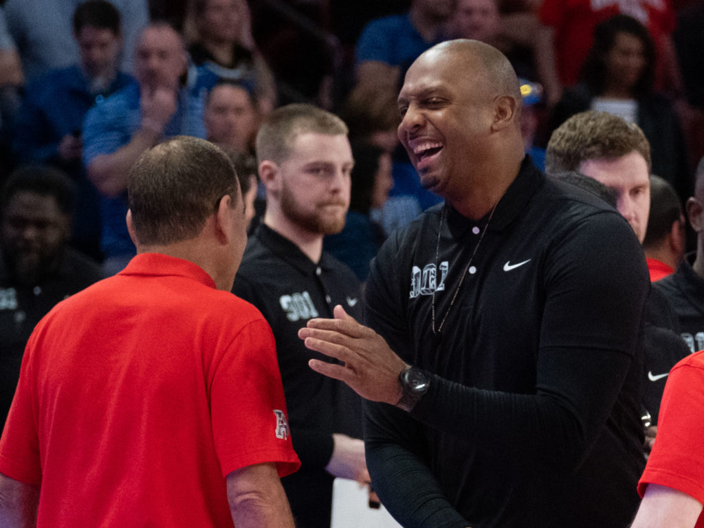 University of Houston coach Kelvin Sampson and Memphis coach Penny Hardaway shared a laugh after what could be one of their last meetings earlier this season. (Photo by F. Carter Smith)