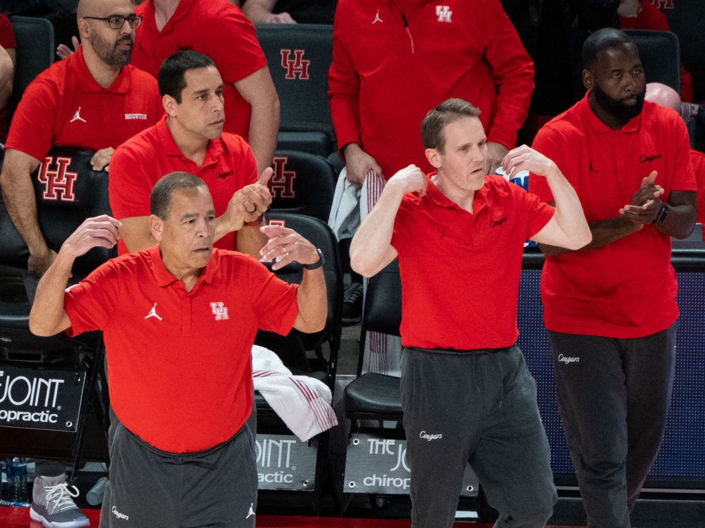 University of Houston coach Kelvin Sampson sometimes has a timeout mini me in assistant K.C. Beard. (Photo by F. Carter Smith)