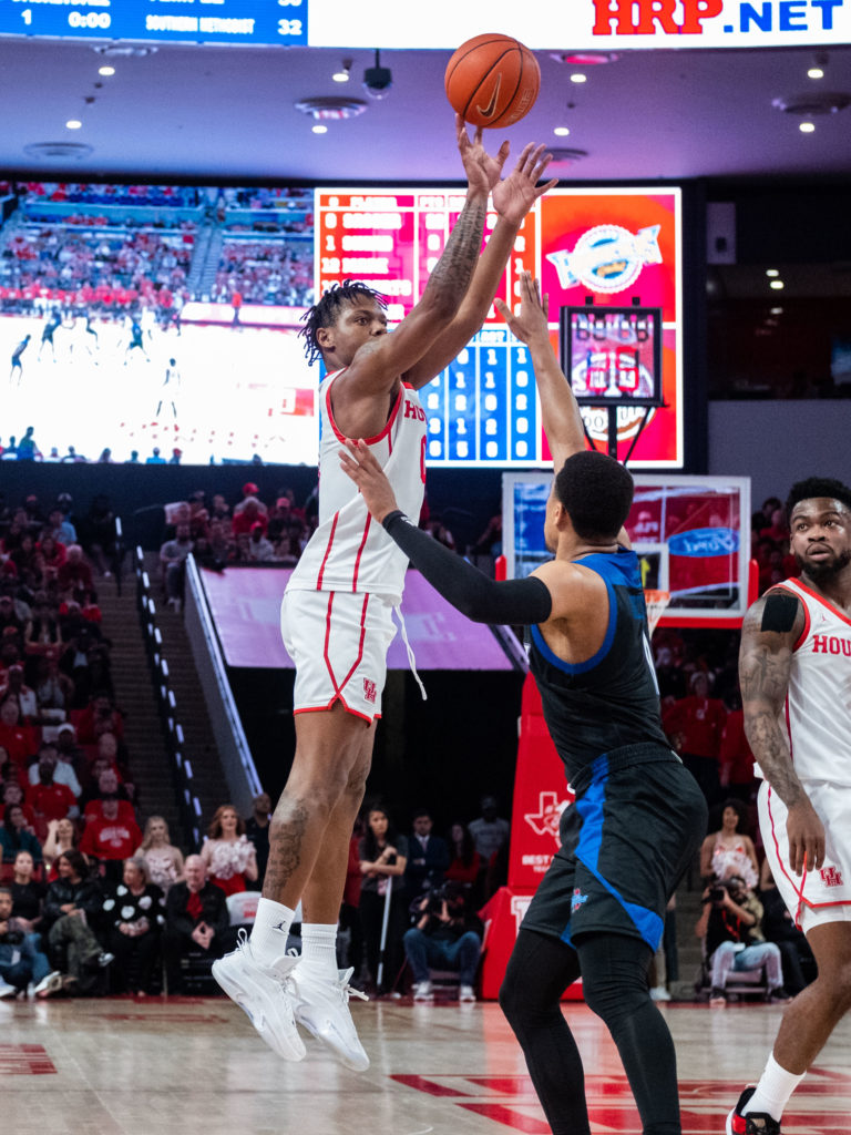 University of Houston guard Marcus Sasser's handle allows him to get a shot off with the tiniest bit of room. (Photo by F. Carter Smith)