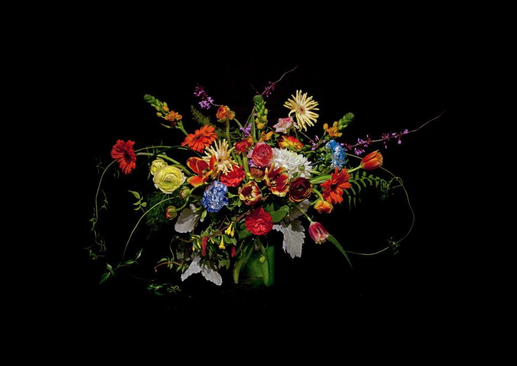 Debra Barrera's "Precious Twin, Blue Carnations," 2020. Houston-based artist Debra Barrera’s powerful and detailed photograph of a floral arrangement with family and cultural resonances