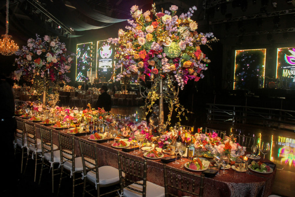 Magnificent table settings  at the San Luis Salute Mardi Gras ball at the Galveston Island Convention Center at The San Luis Resort. (Photo by Gary Fountain)