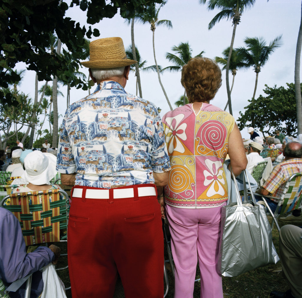 Gay Block's "Miami, South Beach (my shadow on red pants)," 1982. Longtime HCP supporter Gay Block’s hysterical image of a couple in South Beach, Miami, in the 1980s explodes with delightful bright color and patterning