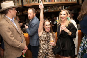 Guests celebrating the announcement of Shania Twain as the ball_s headliner (Photo by Tamytha Cameron)