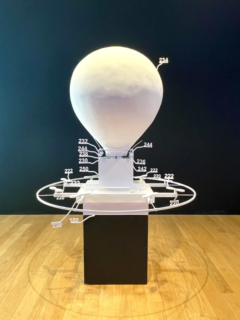 Simon Denny's Amazon delivery drone patent drawing of virtual Rio Tinto mineral globe. (Photo by Courtney Dabney)