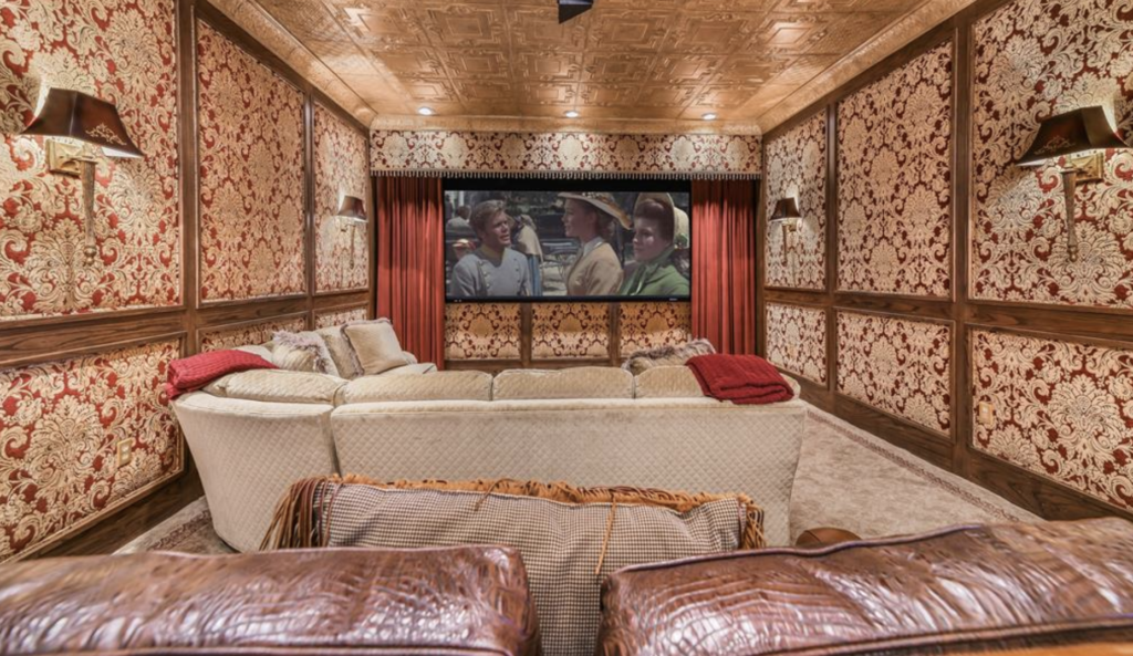 The media/game room is modeled after an 1800s saloon.