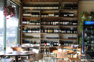 Olivella’s new dine-in space is filled with tables, booths and a full bar.