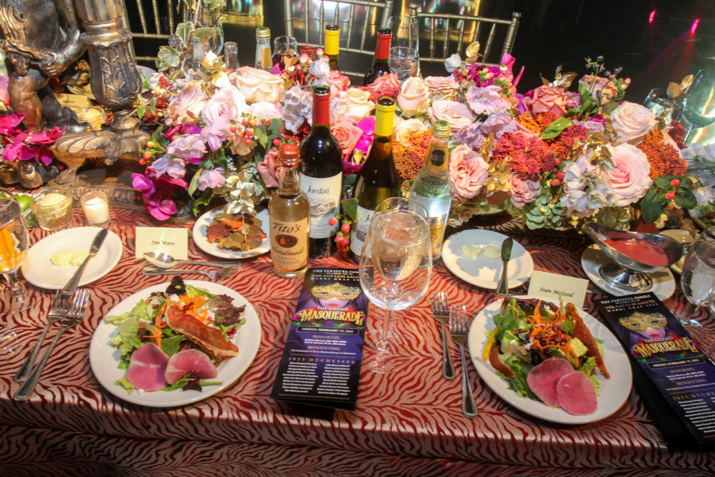 Magnificent table settings  at the San Luis Salute Mardi Gras ball at the Galveston Island Convention Center at The San Luis Resort. (Photo by Gary Fountain)