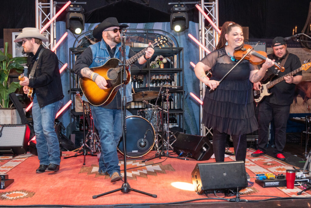 The Kurt Van Meter band at The Ranch Saloon -- Steakhouse at Rodeo Houston where Cole Hauser joined in singing on stage.
