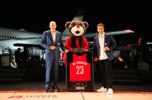 Memorial Hermann Health System president and CEO Dr. David Callender with Clutch and Patrick Fertitta at the Houston Rockets Clutch City Foundation gala at the Landry's hangar at Hobby Airport. That's the Rockets' jet in the background.