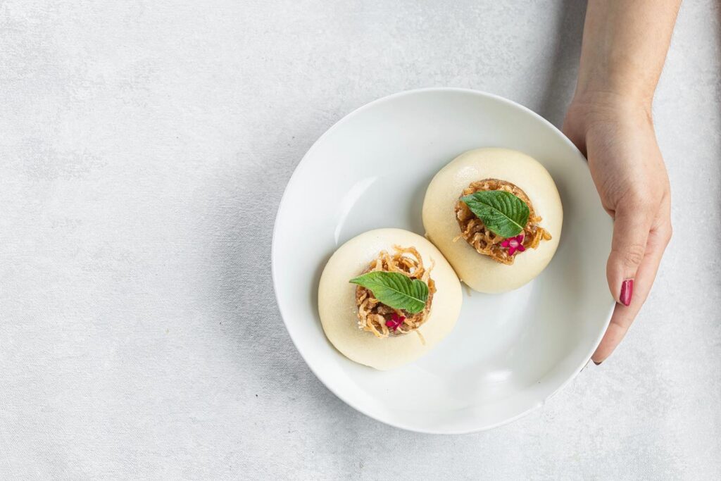Mot Hai Ba's Bánh Bao buns are a must-try. (Photo by Kathy Tran)