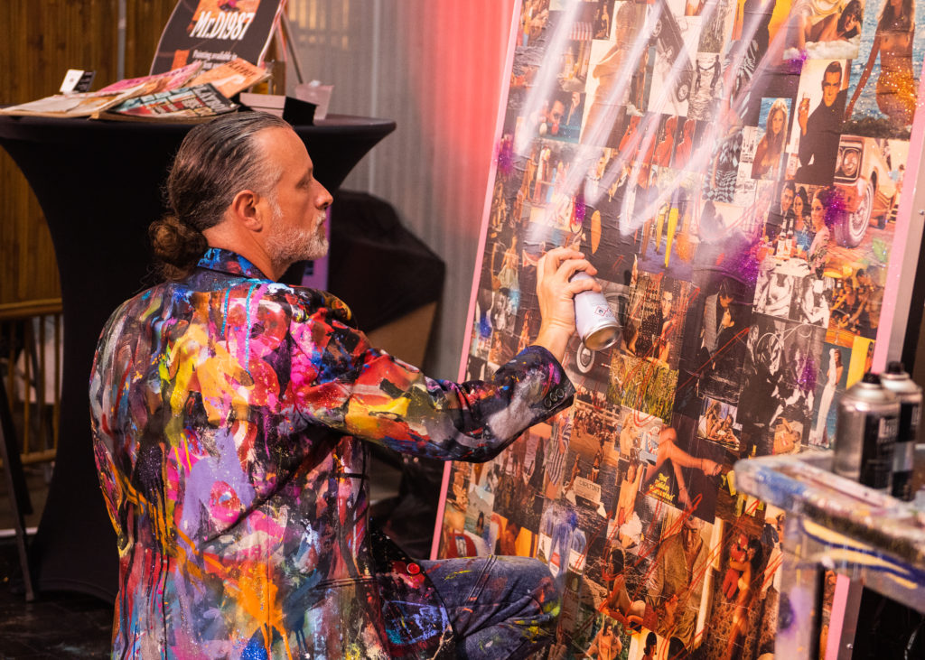 Sebastien “Mr. D 1987” Boileau, Thunder Ball chair, in the midst of a live painting performance (Photo by Viva La Marx Photography)