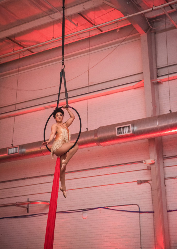 Acrobats perform in midair at Fresh Arts Thunder Ball. (Photo by Viva La Marx Photography)