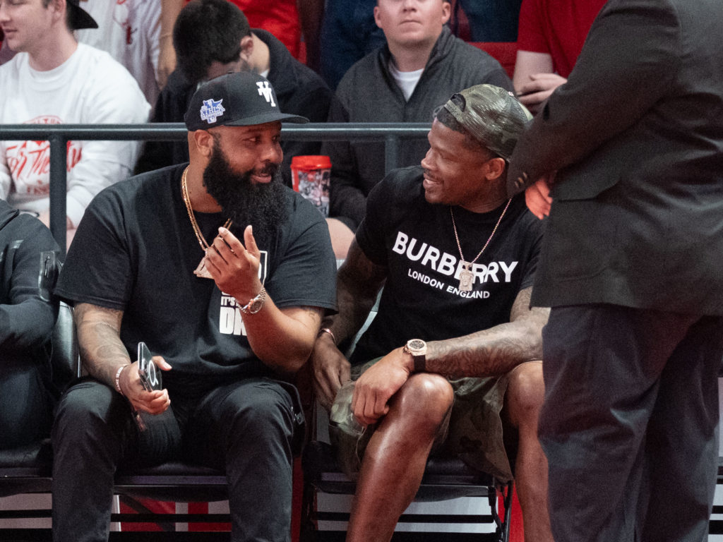 Even Houston Texans great Andre Johnson (right) knows the Fertitta Center is the place to be.  (Photo by F. Carter Smith)