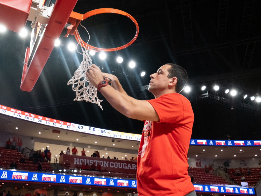 UH assistant coach Kellen Sampson is a big part of this run of net cutting moments.  (Photo by F. Carter Smith)