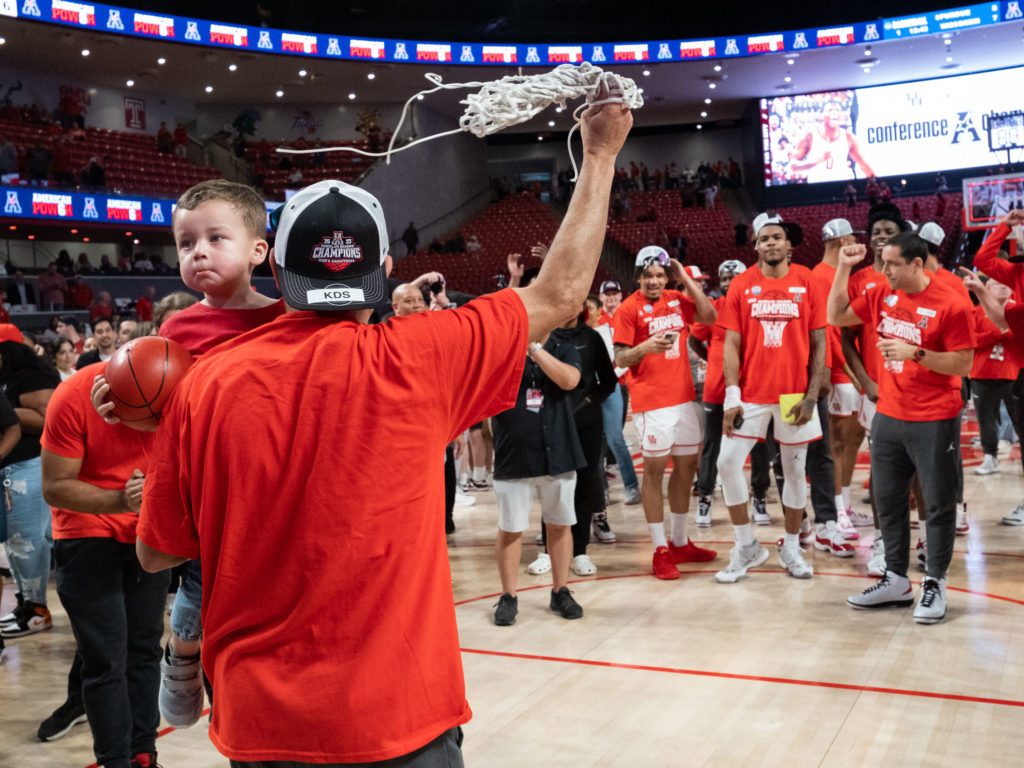 UH coach Kelvin Sampson brought his grandson Kylen along for ride on championship night.  (Photo by F. Carter Smith)