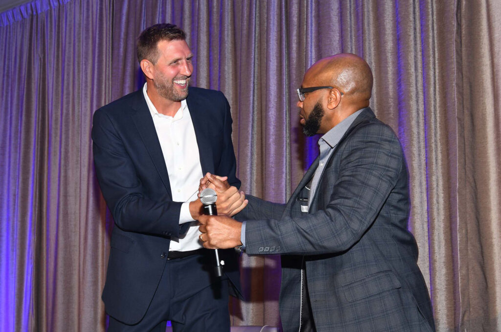 Dirk Nowitzki, Donovan Lewis Shaking Hands (Photo by Kristina Bowman)