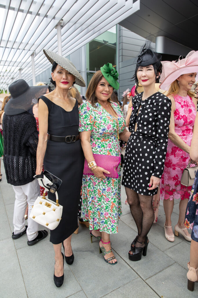 Duyen Nguyen, Debbie Festari, Carrie Brandsberg-Dahl at the Hermann Park Conservancy's 'Hats in the Park' luncheon (Photo by Jenny Antill)