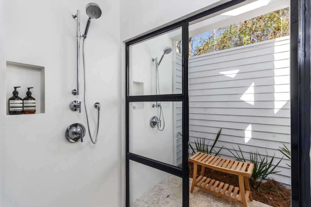 An indoor/outdoor shower. 