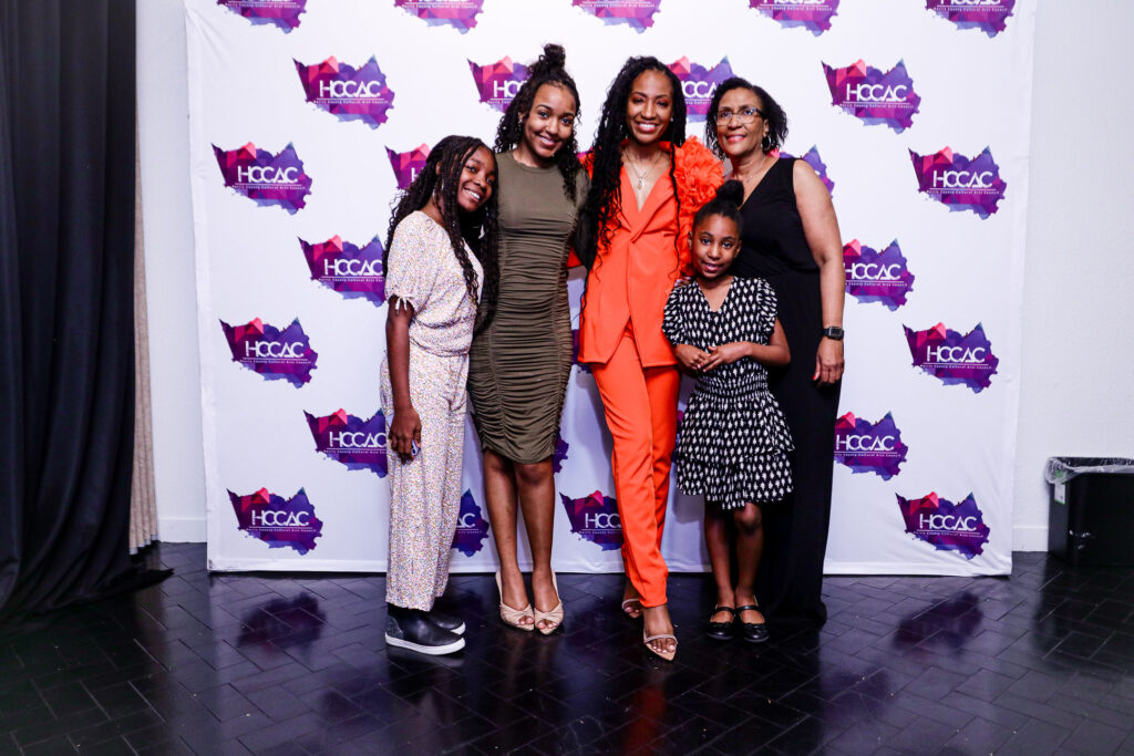 Chasity Sereal (in pink) with family. Left to right: daughter Kirstyn Jenkins, sister Chelsea Sereal, daughter Kendall Jenkins, mother Aretha Sereal (Photo by Tye Visuals Photography)