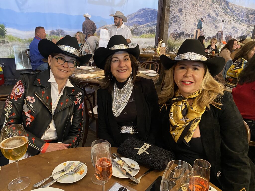 Champagne Cowgirls Bobbie Nau, Ellie Francisco, Cyndy Garza Roberts during a special afternoon at The Ranch at the Houston Livestock Show and Rodeo. (Photo by Shelby Hodge)
