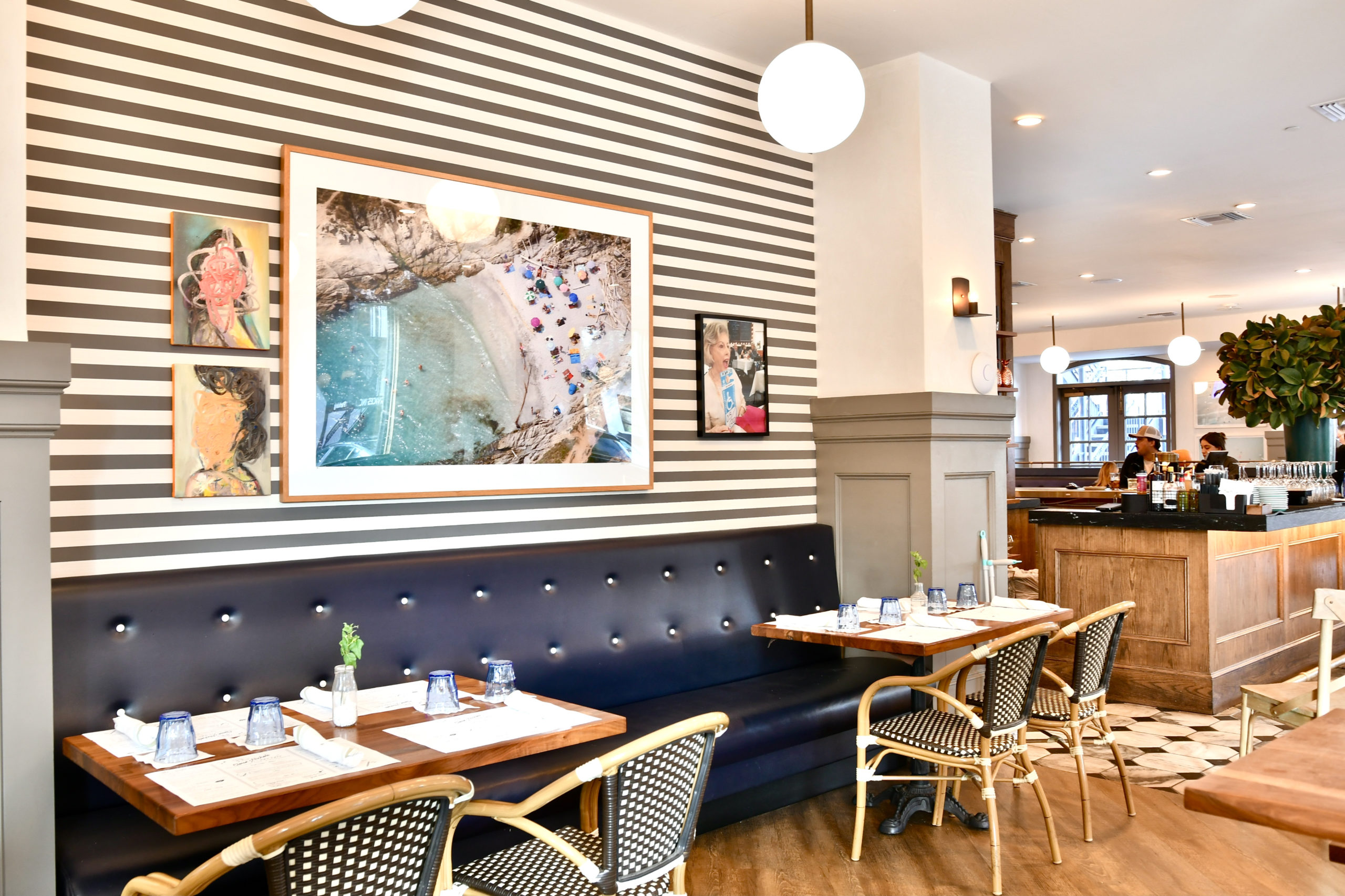 The new refreshed interior of Eloise Nichols includes this punchy green striped wallpaper. (Photo by Alex Montoya)
