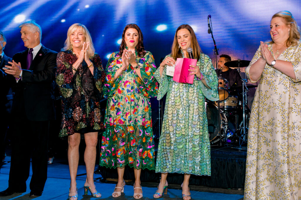 Raffle winners were announced as the evening drew to a close. Shannon Shivers, JCB president pictured right. (Photo by Canon Elizabeth Photography)