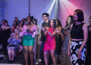 Guests cheer on the dance floor at Fresh Arts Thunder Ball. (Photo by Viva La Marx Photography)