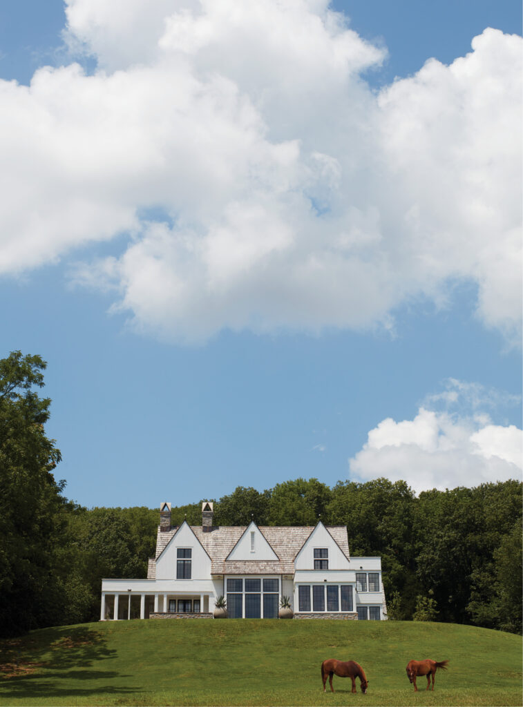 Located in a bucolic landscape in the middle of Tennessee, this is a quintessential farmhouse in the country designed by McAlpine, with a bit of "American Gothic" stoicism. (Photo by Simon Upton)
