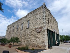 Nutt House – The limestone facade of the Nutt House Hotel leading to the original wagon yard behind.