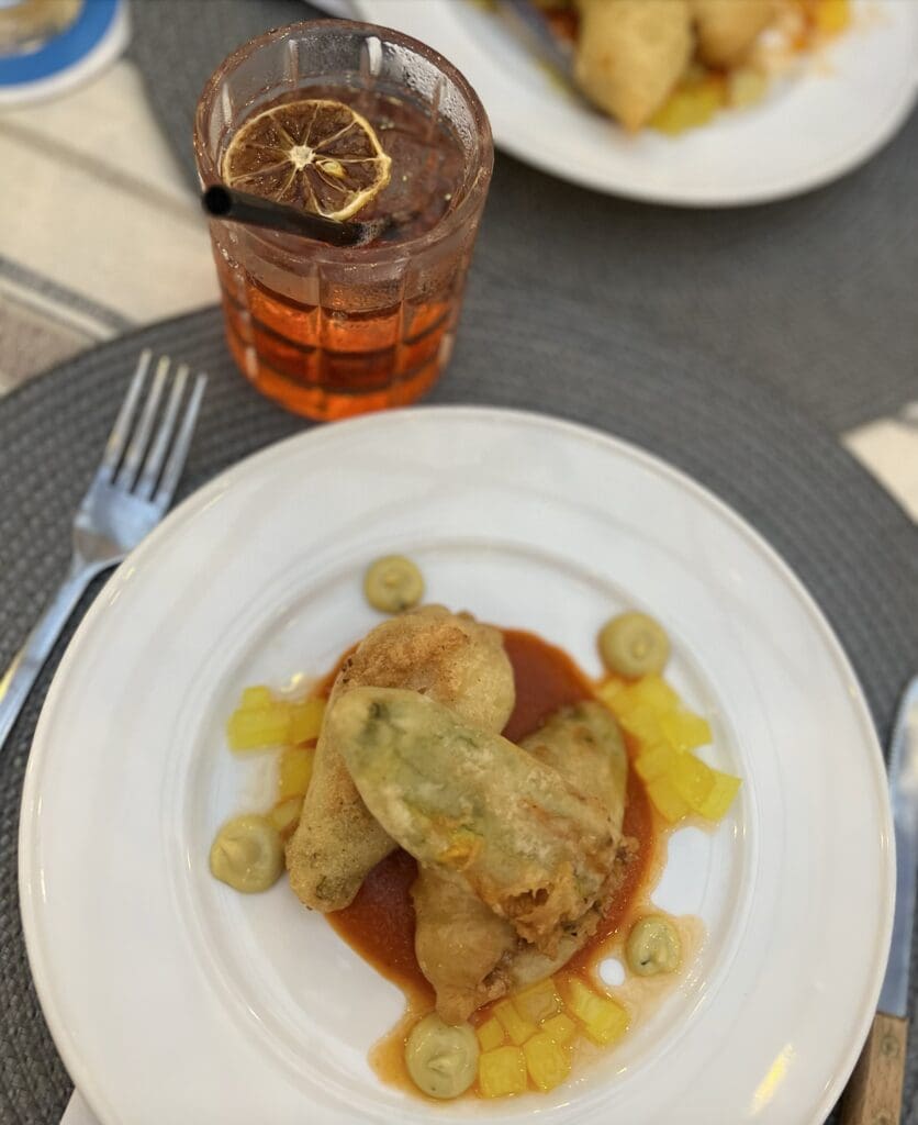 The first course created by Chef Ilias Gugole was Fiori di Zucca Fritti.
(photo: Mia Bonner)