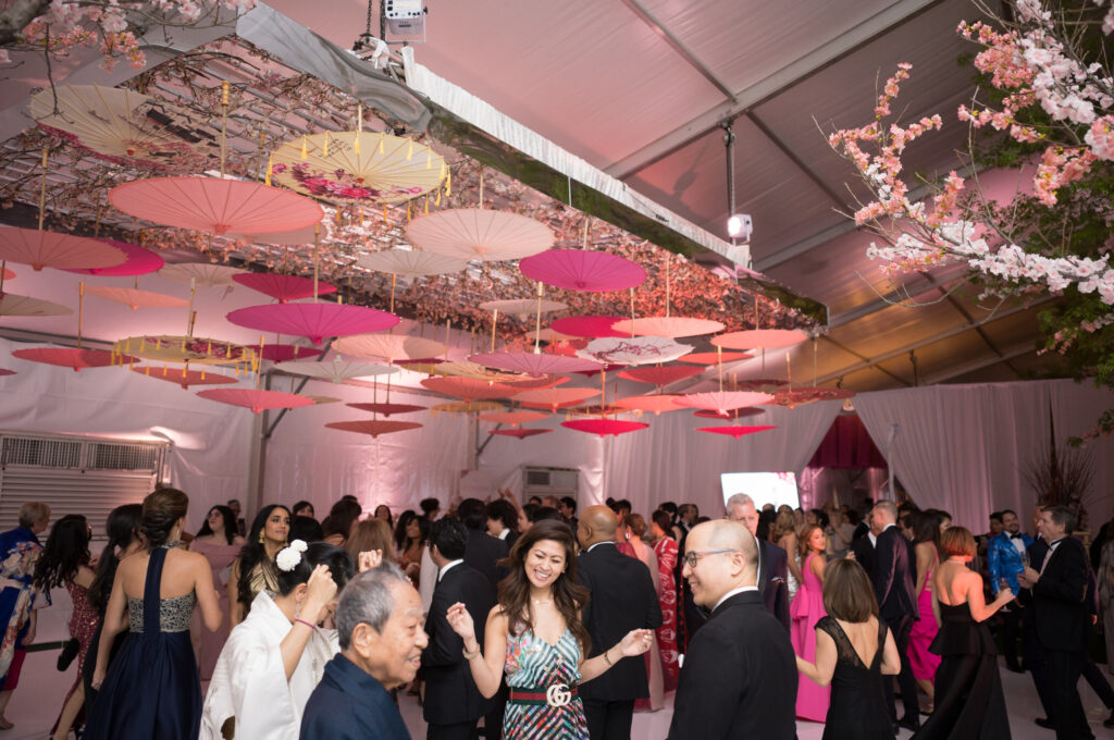 Japanese parasols suspended above the dance floor at Asia Society Texas’ Tiger Ball. (Photo by Daniel Ortiz)