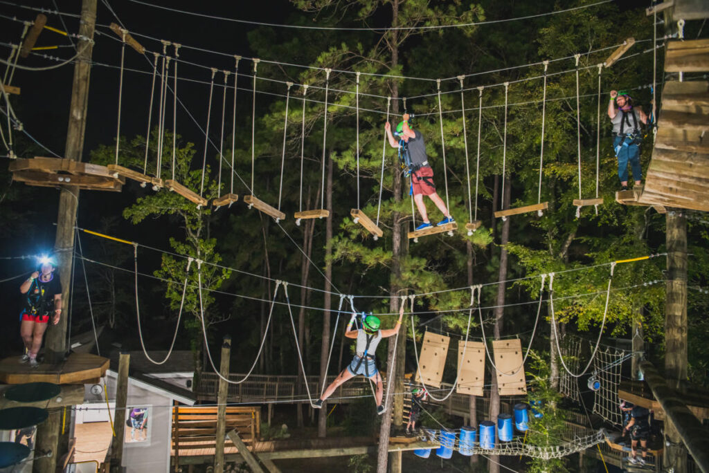 Enjoy the TreeVentures adventure course after dark.