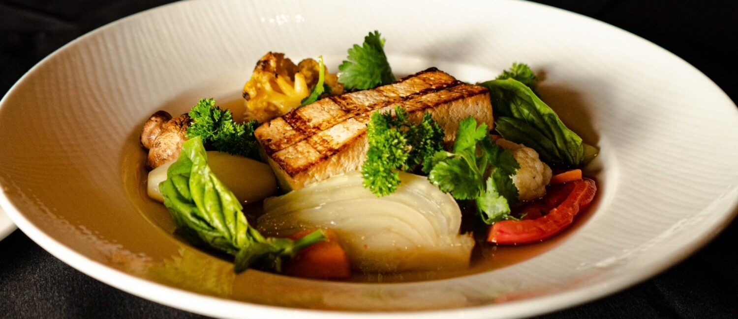 PS-21 serves both the traditional seafood bouillabaisse as well as this vegan version. (Photo by Interiors: Raydon Creative, Food and Drink: Harold Cua)
