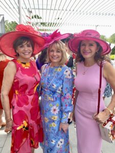 Hallie Vanderhider, Kelley Lubanko, Alex Blair at the Hermann Park Conservancy’s ‘Hats in the Park’ luncheon (Photo by Shelby Hodge)