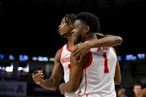 Tramon Mark picked up UH point guard Jamal Shead (No. 1) and everyone else on Houston’s roster in the NCAA Tournament road win comeback over Auburn.