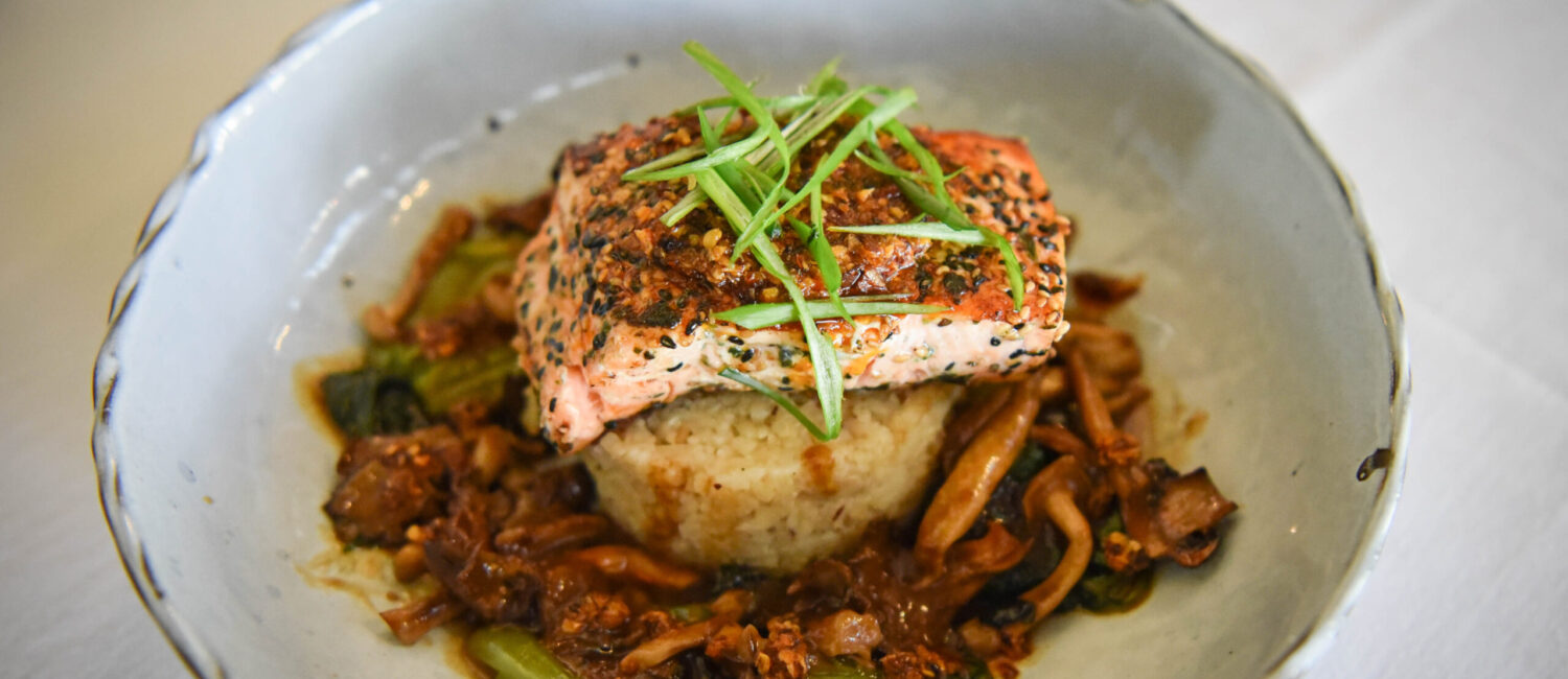 Grilled salmon is a menu favorite at popular island-inspired Tommy Bahama restaurant in The Woodlands.