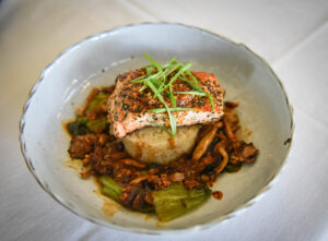 Grilled salmon is a menu favorite at popular island-inspired Tommy Bahama restaurant in The Woodlands.