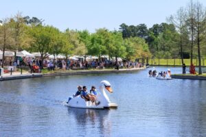 Artists have booths along the Waterway for The Woodlands Waterway Arts Festival.