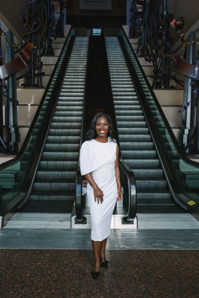 Allyson Pritchett is wearing a Badgley Mischka dress from Tootsies.(Photo by Johnny Than)
