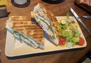 The paninis can be paired with a romaine salad or Yukon gold potato chips at Postino Woodlands. (Photo by Jenn Duncan)