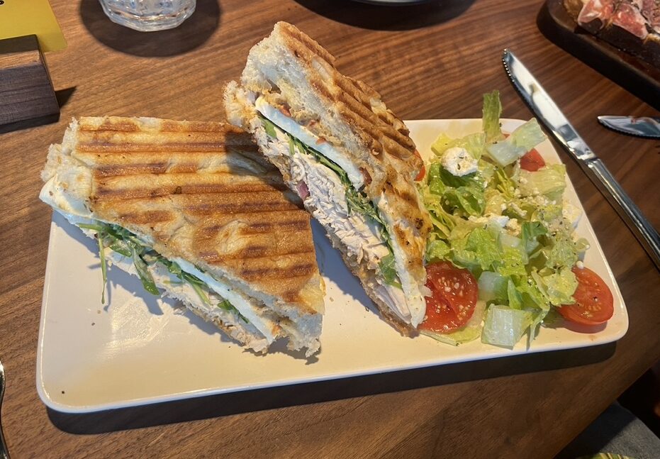 The paninis can be paired with a romaine salad or Yukon gold potato chips at Postino Woodlands. (Photo by Jenn Duncan)