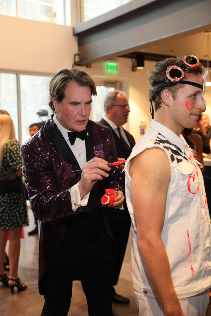 George Lancaster gets into the art act. (Photo by Priscilla Dickson)