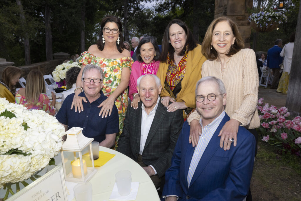 Standing (L to R): Alberta Taubert, Lea Ann Blum, Linda Springer, and  Jan McConnell. Seated (L to R): Jim Taubert, Drew Springer, and Brad McConnell at the Fort Worth Garden Club Evening in the Garden. (Photo by Ellman Photography)