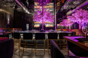 Inside the new Muse restaurant, you'll find pink uplit cherry blossom trees. (Photo by Adrian Barboza)
