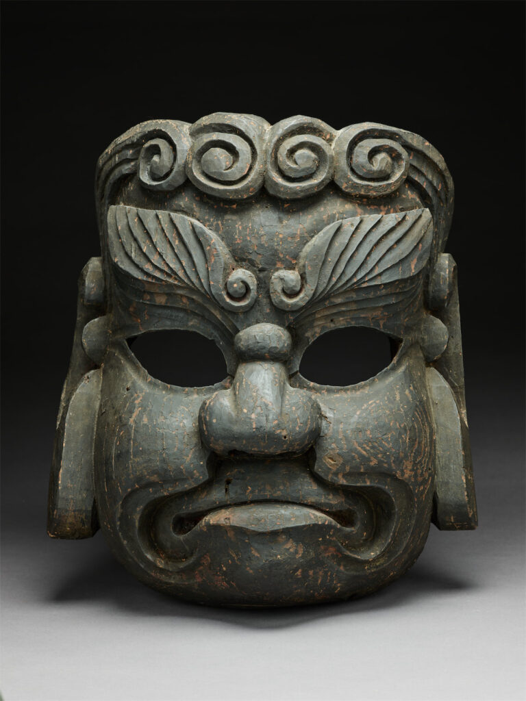 Mask of a kitchen guardian deity. Edo period, 19th century. Kitakami area, between northern Miyagi to southern Iwate prefectures. Carved and stained wood. (Photo by Chadwick Redmon)
