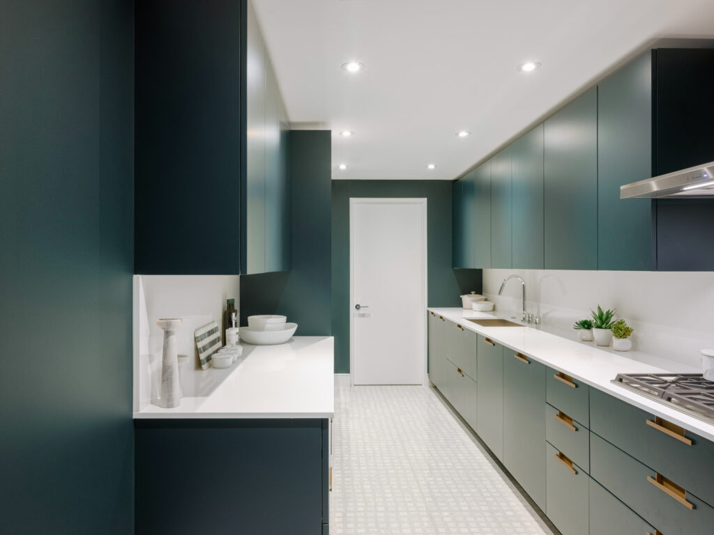 This secondary kitchen design uses the Maxima 2.2 in custom lacquer finish with Ouverture handles in Champagne and a Vicostone countertop in Super White (Photo by Divya Pande)