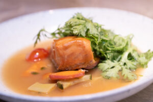 Chef Chris Shepherd and Syvert Garcia’s Alaska King Salmon Sinigang; Photo by Wilson Parish
