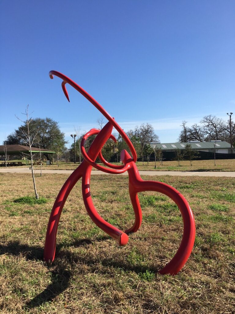 When the sun hits the "Dancing Steelroots" at a certain angle, their shadows make a calligraphy symbol on the ground! (Photo by Daisuke Shintani)
