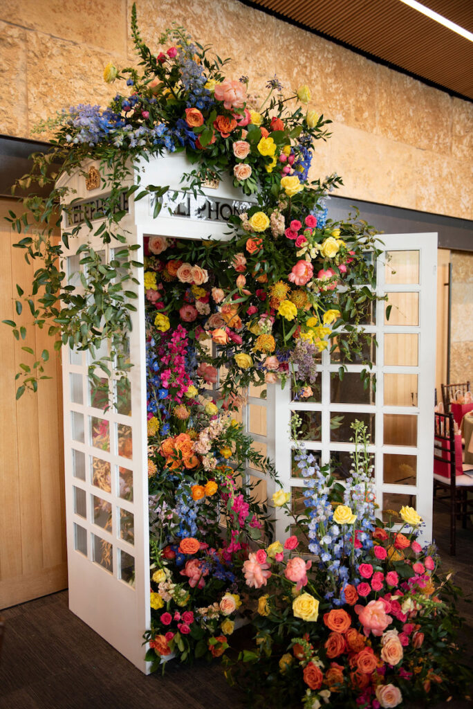 Floral arrangement out of telephone booth (Photo by Tamytha Cameron and Celeste Cass)