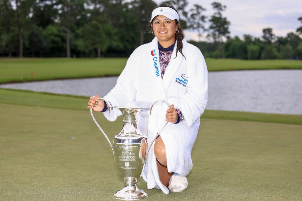 Lilia Vu jumped into the pond and got soaked with champagne to celebrate her first Major title at the Chevron Championship. (Photo by Carmen Mandato/Getty Images)
